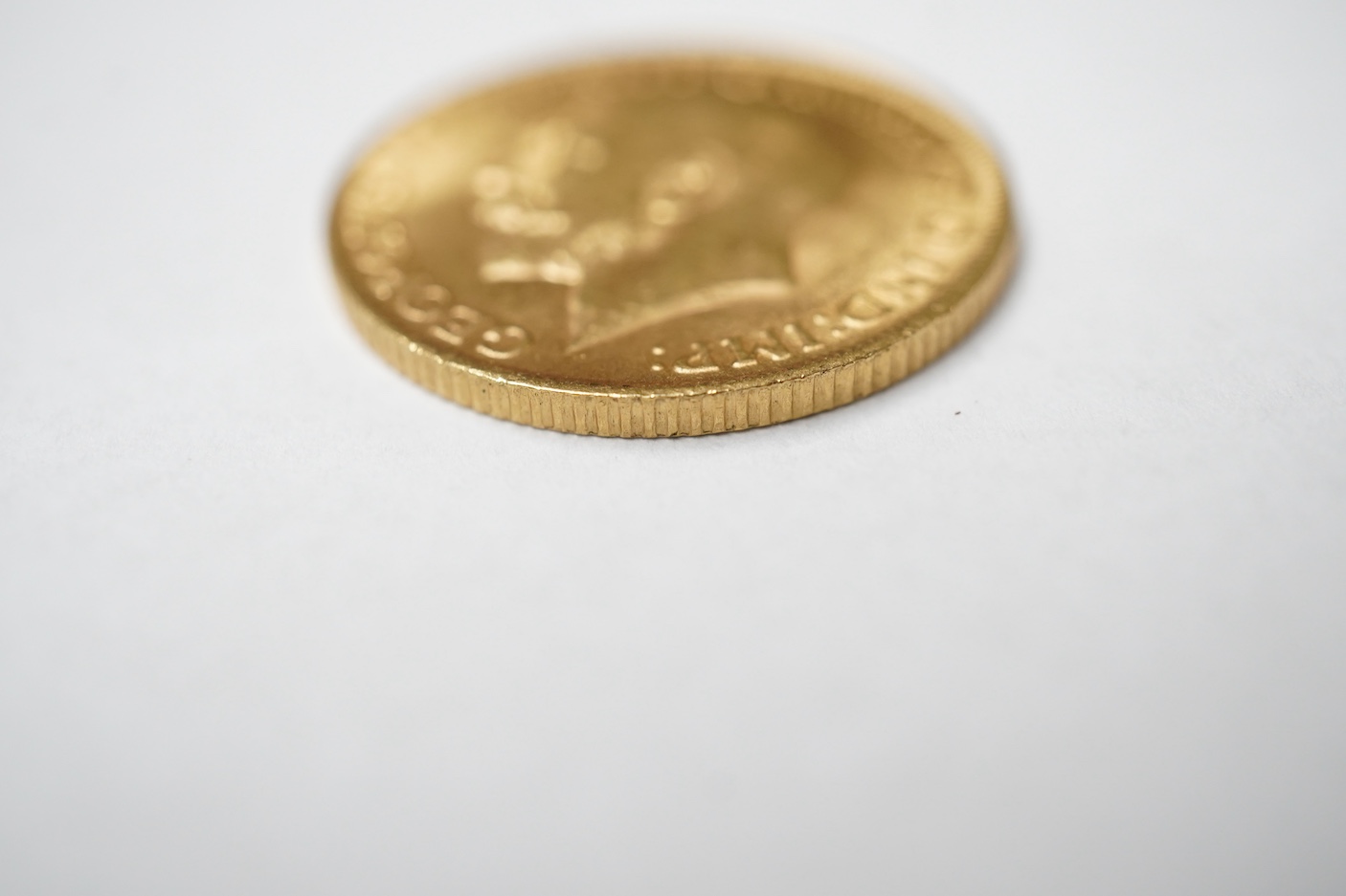 British gold coins, George V gold sovereign, 1915, about EF.
